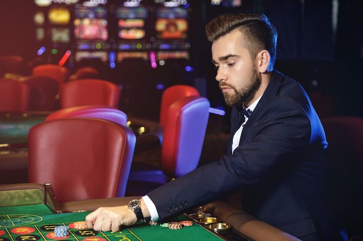 Tampilan permainan Mega Moolah di starball dengan simbol safari dan tampilan jackpot progresif